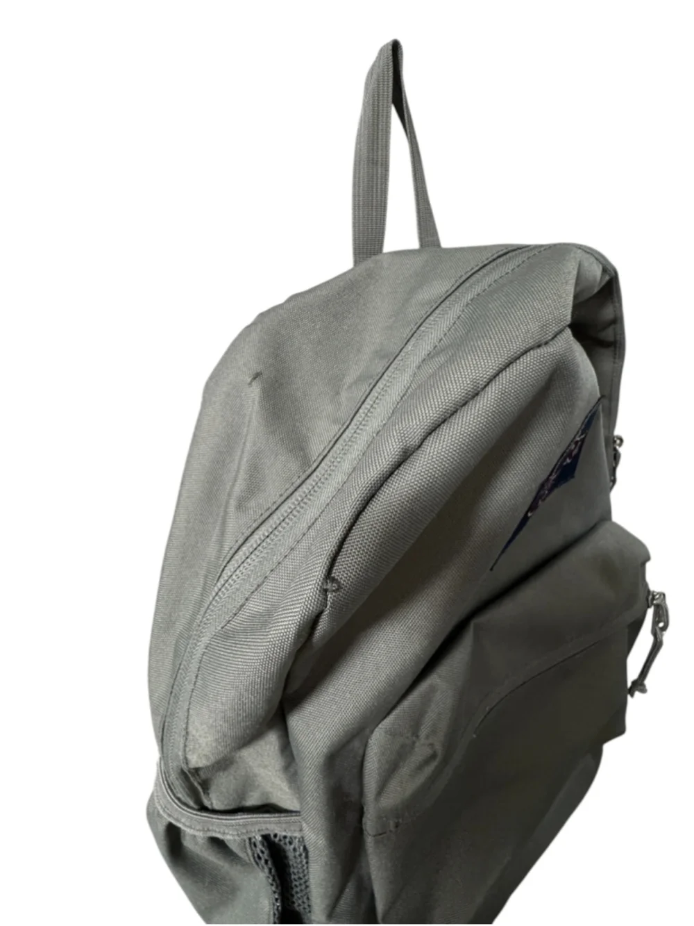 Jansport Grey Backpack with side pocket grey, top zip and front pocket. Light